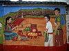 Una madre en Pintura de San Juan Comalapa